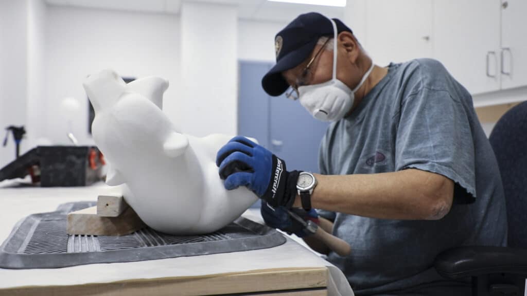 Saila Kapinek, an Inuit patient of The Ottawa Hospital, carving