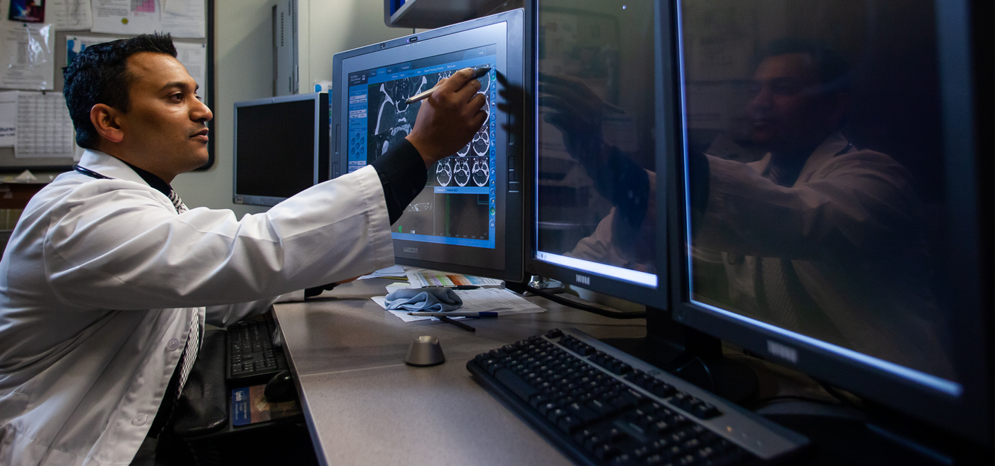 Cancer research looking at monitor