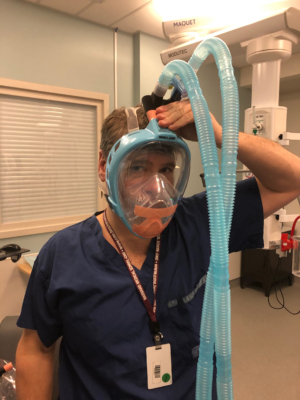 Dr. David Neilipovitz trying on a prototype mask