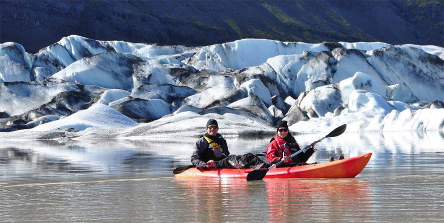 Bryde Fresque, who was treated for a rare pheochromocytoma at The Ottawa Hospital, pictured kayaking in Iceland with his wifte, Natalie.