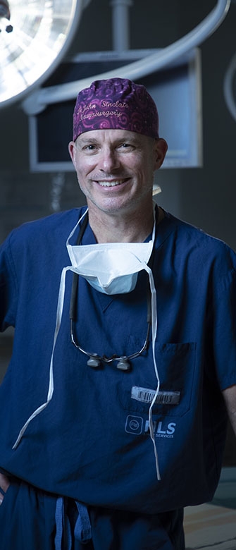 Neurosurgeon Dr. John Sinclair inside an operating room at The Ottawa Hospital, Civic Campus
